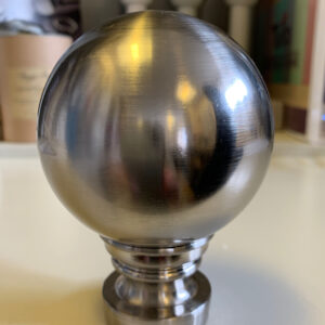 silver-finials