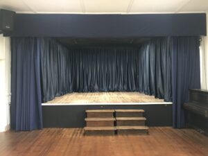 church-hall-stage-curtains-open